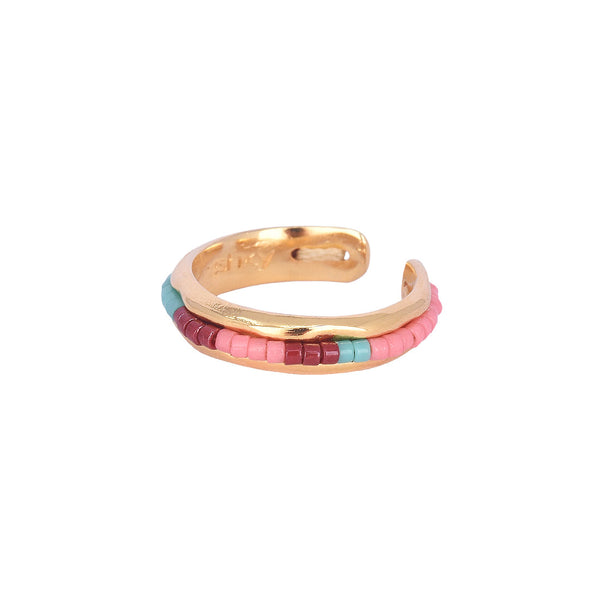 Anillo ajustable con diseño de cuentas bañadas en oro.